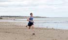 Ross Floyd (Morpeth) finishing 3rd in the Pier to Pier Race, South Shields to Roker, Sunderland.